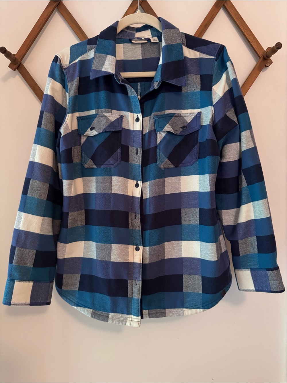 LL Bean Flannel Blue Plaid Button-Up Shirt with side pockets and elbow patches.
